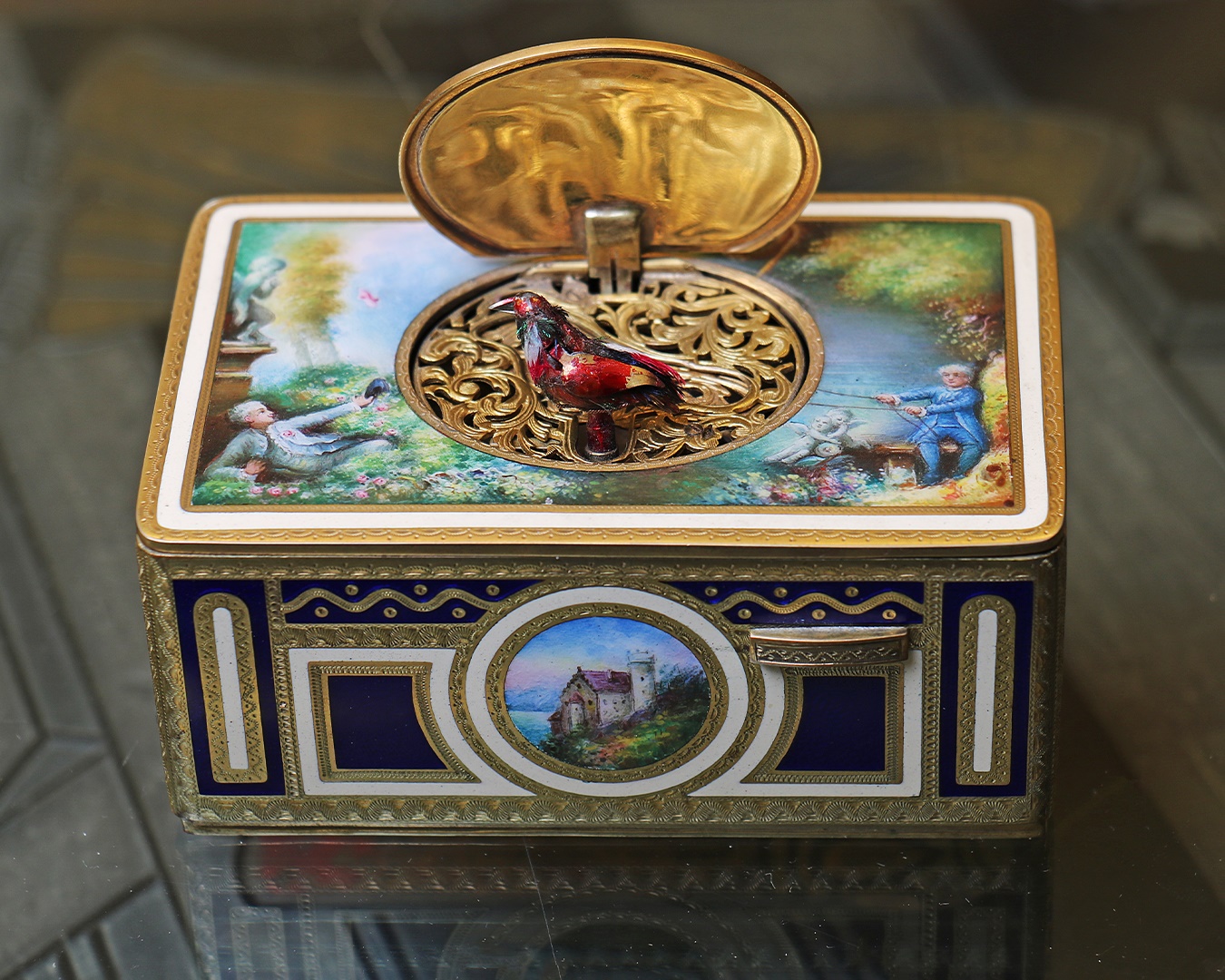 An enamelled musical bird box by Karl Griesbaum of Triberg